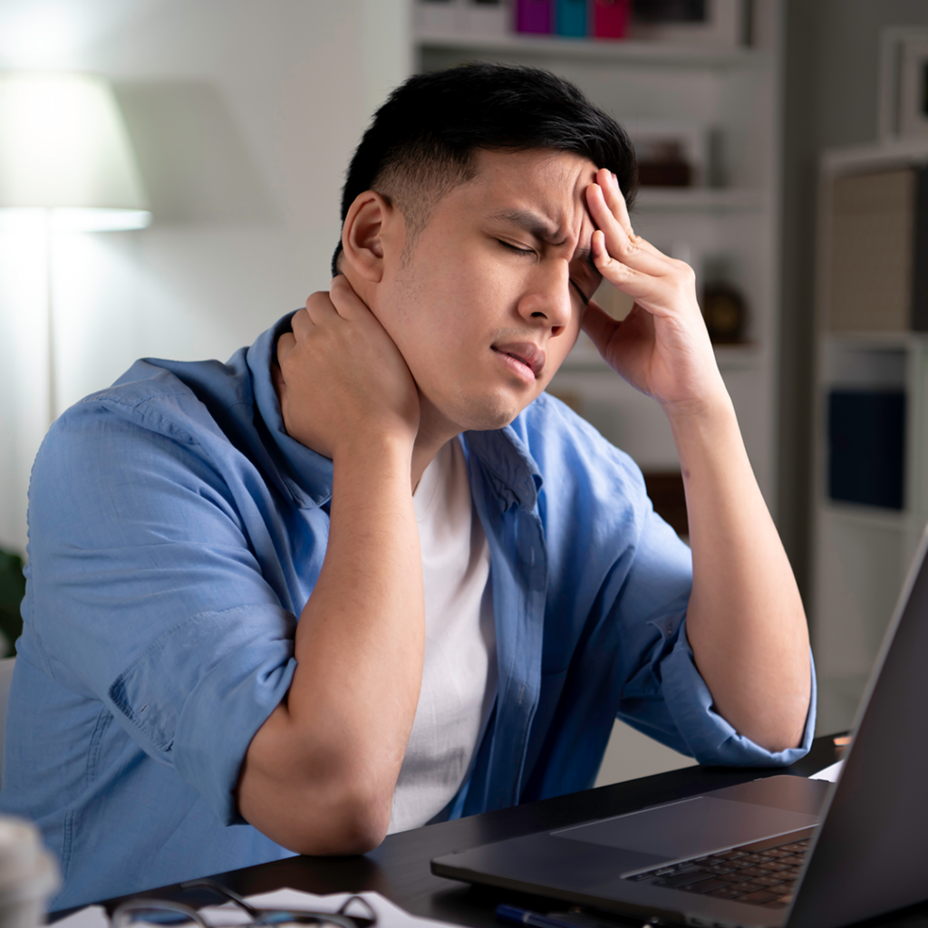 man suffering from headache